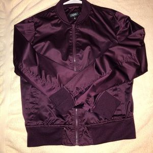 burgundy colored windbreak zip up jacket